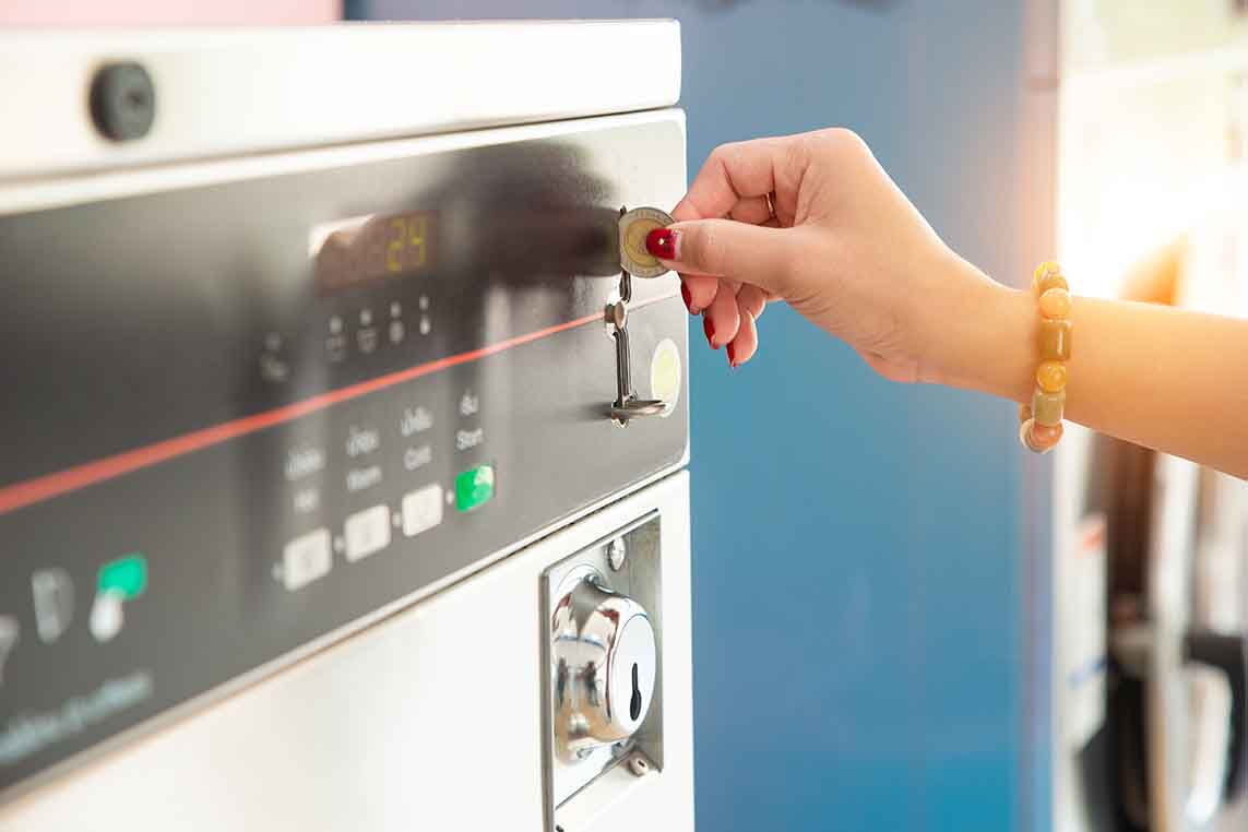 Why are most laundromats still coin operated